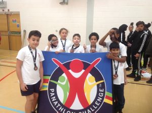 Image of pupils holding the Panathlon Challenge sign