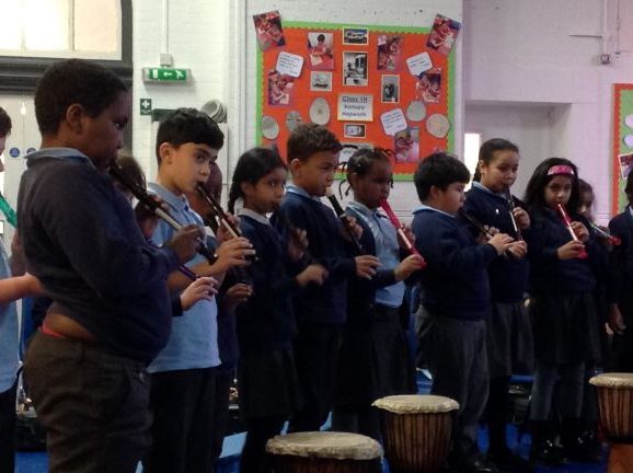 image of year 3 children playing the recorder